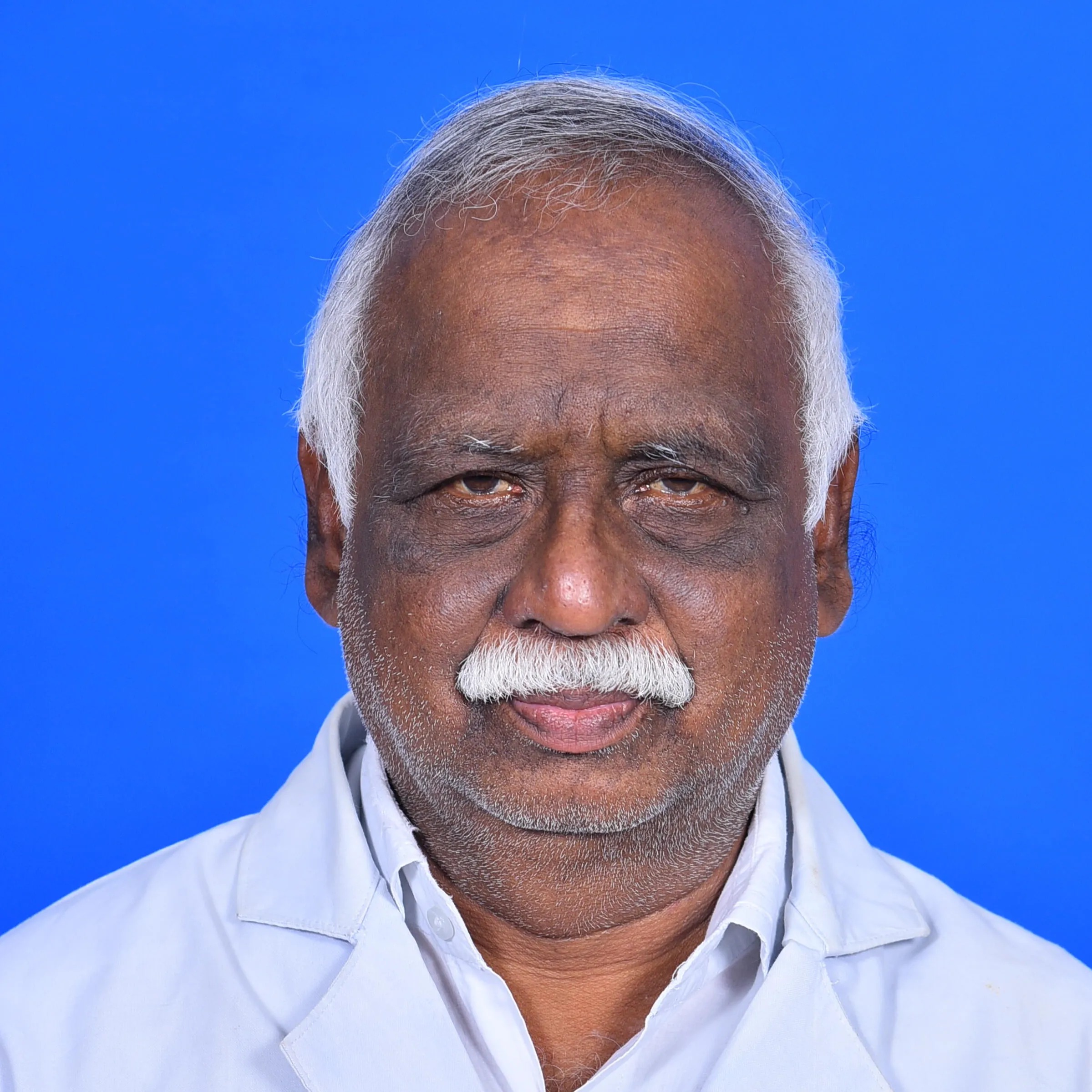 Dr. C. GANESAN