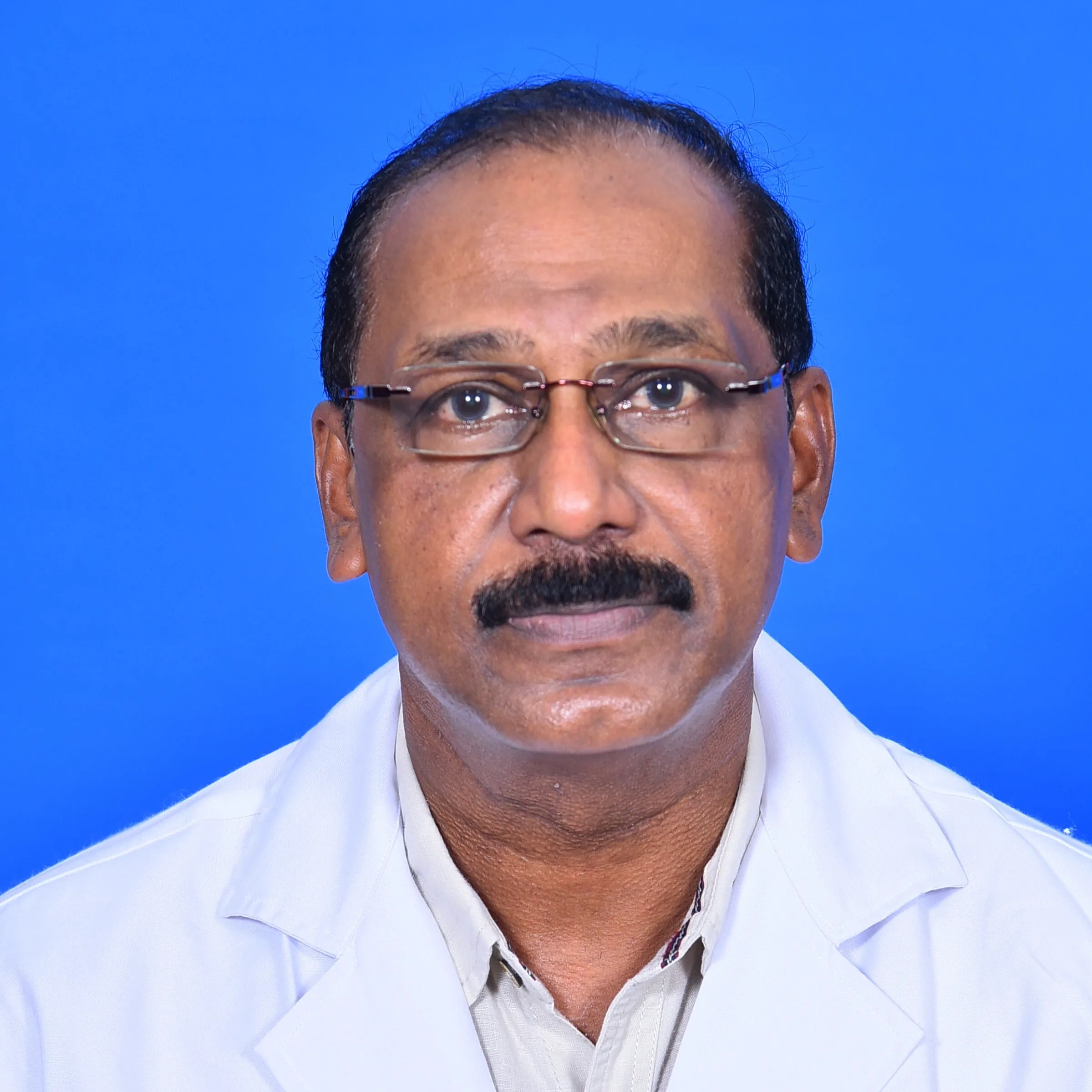 Dr. R. YOGAN