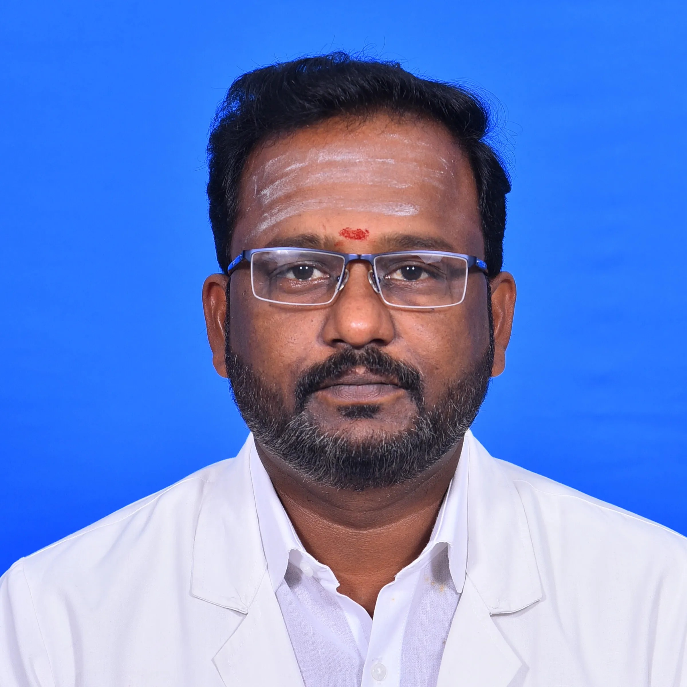 Dr. V. MANIBALAN